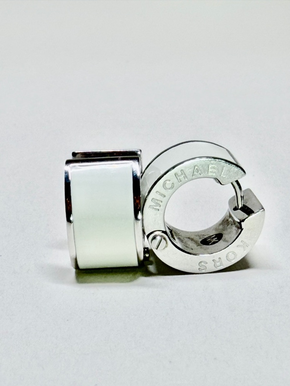 MICHAEL KORS White and Silver Tone Reversible Huggie Hoop Earrings